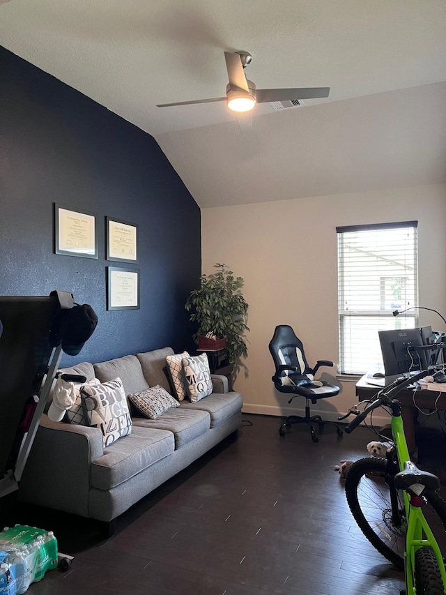 25215 Quiet Run Trl, Richmond, TX 77406 - living area featuring wood finished floors, a ceiling fan, visible vents, baseboards, and lofted ceiling