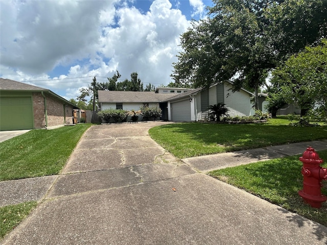 14835 Scotter Dr, Houston, TX 77015 - mid-century home with concrete driveway, an attached garage, and brick siding