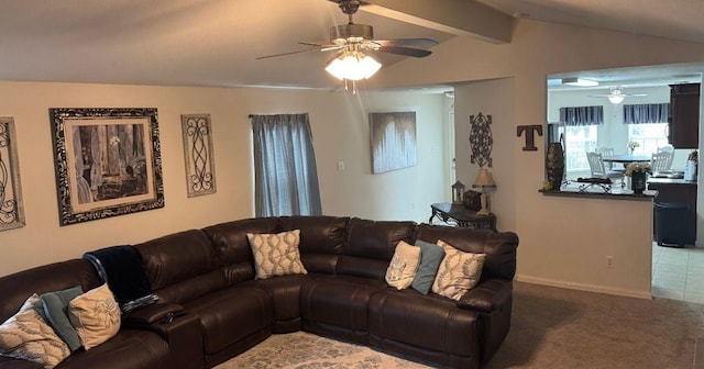 living room featuring carpet flooring, lofted ceiling with beams, and a ceiling fan