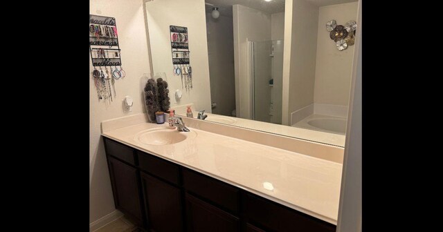 22706 Threefold Ridge Dr, Hockley, TX 77447 - bathroom with vanity and a shower