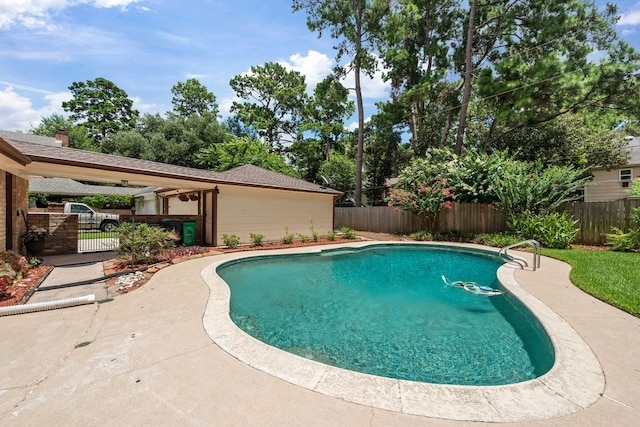 view of pool featuring a gate, a fenced in pool, and a fenced backyard
