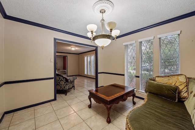 interior space with a wealth of natural light, crown molding, and a textured ceiling
