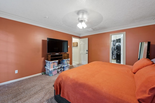 carpeted bedroom featuring a ceiling fan, a textured ceiling, baseboards, visible vents, and crown molding