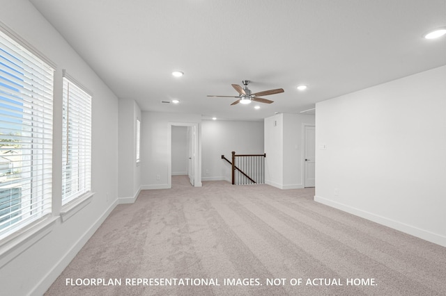 5042 Celestial Ct, La Marque, TX 77563 - unfurnished room featuring recessed lighting, light carpet, ceiling fan, and baseboards