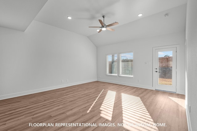 5042 Celestial Ct, La Marque, TX 77563 - spare room featuring light wood-style floors, a ceiling fan, baseboards, vaulted ceiling, and recessed lighting