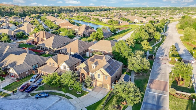 birds eye view of property with a residential view