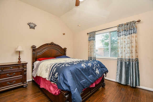 bedroom with lofted ceiling, baseboards, a ceiling fan, and wood finished floors