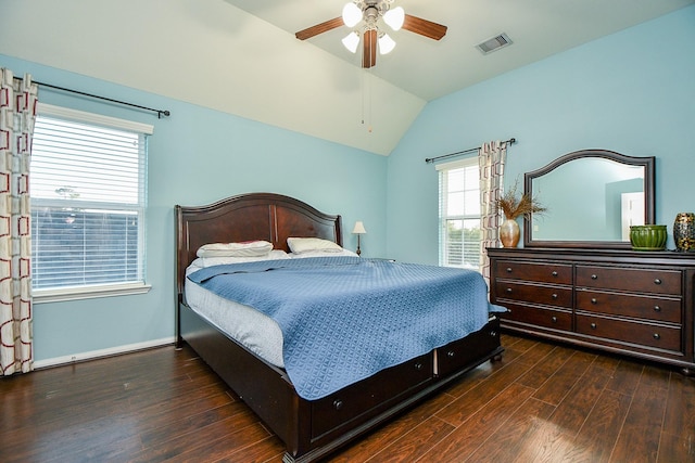 bedroom featuring lofted ceiling, a ceiling fan, visible vents, and wood finished floors