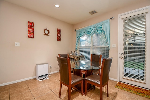 dining area with baseboards, recessed lighting, light tile patterned floors, and visible vents