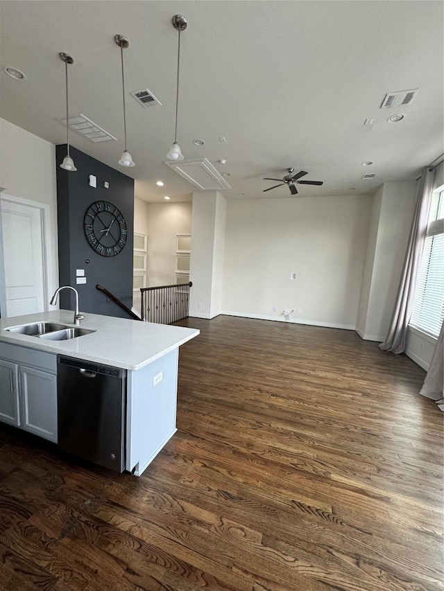 kitchen with dishwasher, visible vents, a ceiling fan, and a sink