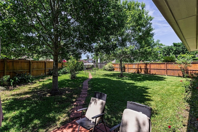 19231 Kelly Pines Ct, Humble, TX 77346 - view of yard featuring a fenced backyard