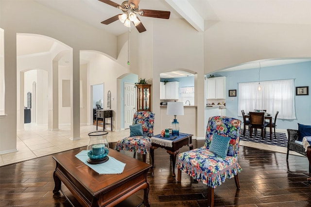19231 Kelly Pines Ct, Humble, TX 77346 - living room with baseboards, light wood-style flooring, ceiling fan, and high vaulted ceiling