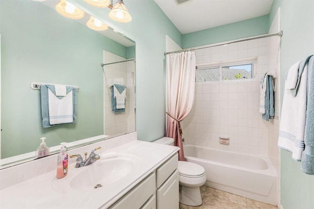 19231 Kelly Pines Ct, Humble, TX 77346 - bathroom featuring toilet, vanity, visible vents, tile patterned floors, and shower / tub combo