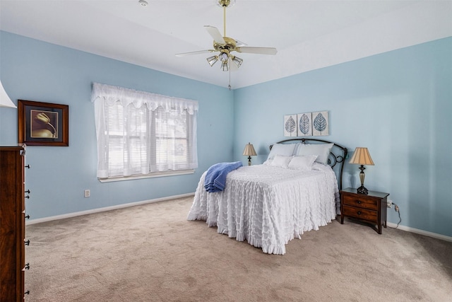 19231 Kelly Pines Ct, Humble, TX 77346 - carpeted bedroom with baseboards and a ceiling fan