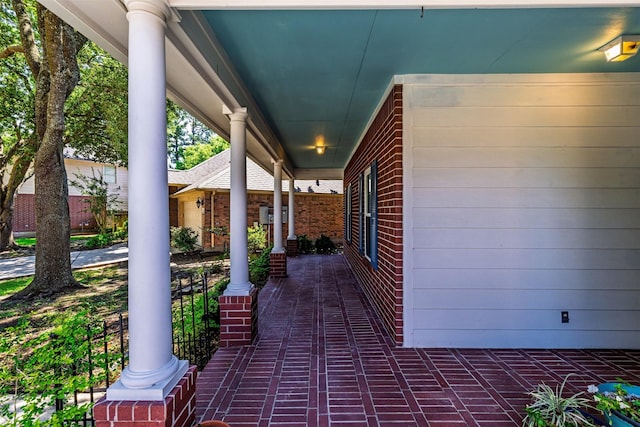 19231 Kelly Pines Ct, Humble, TX 77346 - view of patio / terrace featuring covered porch