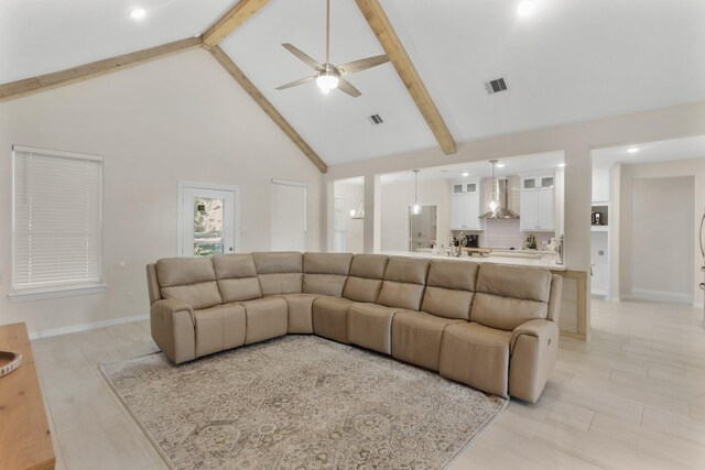 19503 Fisher Dr, Tomball, TX 77377 - living area with beam ceiling, visible vents, a ceiling fan, and high vaulted ceiling
