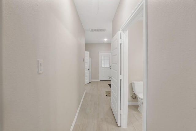19503 Fisher Dr, Tomball, TX 77377 - hallway featuring baseboards and visible vents