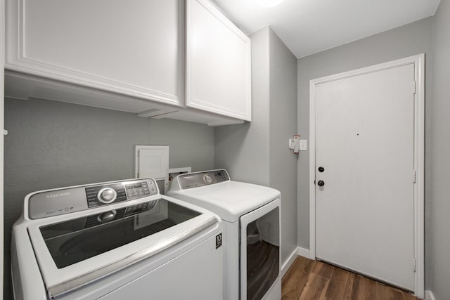 15319 Sableton Crest Ln, Cypress, TX 77429 - washroom featuring baseboards, washer and dryer, cabinet space, and dark wood-type flooring