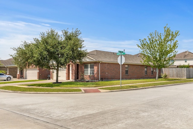 15319 Sableton Crest Ln, Cypress, TX 77429 - single story home featuring a garage, fence, concrete driveway, a front lawn, and brick siding