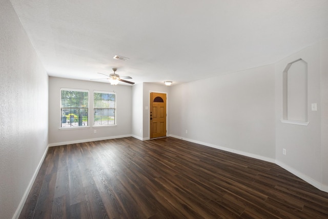 15319 Sableton Crest Ln, Cypress, TX 77429 - unfurnished living room with dark wood-type flooring, baseboards, and a ceiling fan