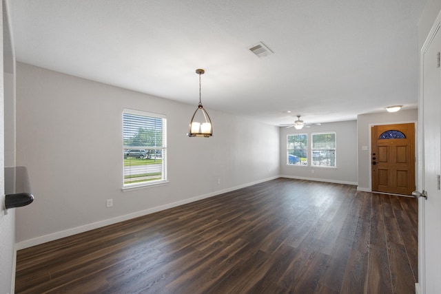 15319 Sableton Crest Ln, Cypress, TX 77429 - spare room featuring a ceiling fan, baseboards, dark wood-type flooring, and visible vents