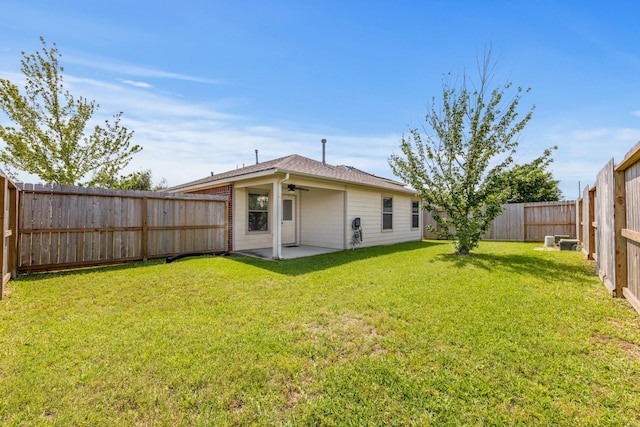 15319 Sableton Crest Ln, Cypress, TX 77429 - back of house with a lawn, a patio area, ceiling fan, and a fenced backyard