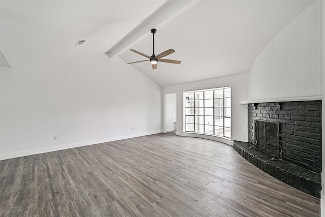 512 Stoneledge Dr, Friendswood, TX 77546 - unfurnished living room featuring wood finished floors, ceiling fan, a brick fireplace, and baseboards