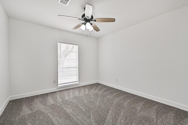 512 Stoneledge Dr, Friendswood, TX 77546 - spare room with dark carpet, baseboards, and ceiling fan