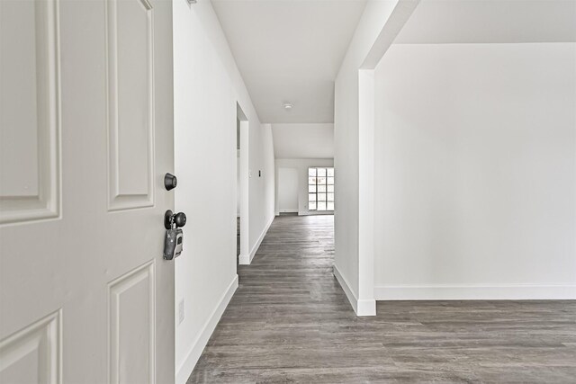 512 Stoneledge Dr, Friendswood, TX 77546 - hallway with baseboards and wood finished floors