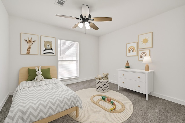 512 Stoneledge Dr, Friendswood, TX 77546 - carpeted bedroom with baseboards and ceiling fan