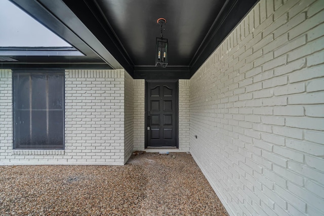 213 Westview Dr, Sealy, TX 77474 - doorway to property with brick siding
