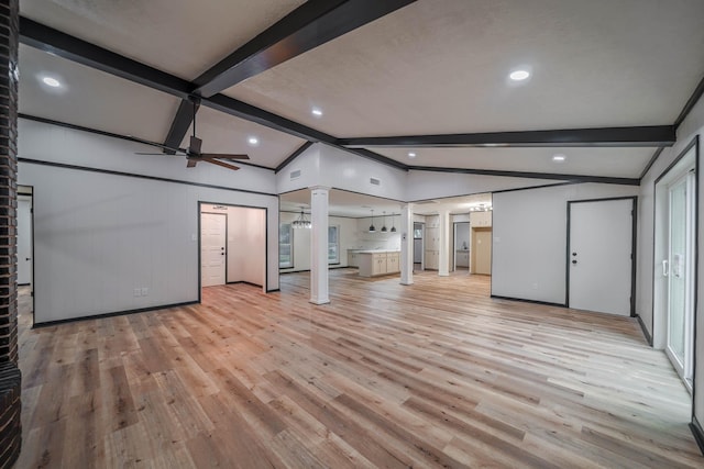 213 Westview Dr, Sealy, TX 77474 - unfurnished living room with light wood-style flooring, recessed lighting, ceiling fan, decorative columns, and lofted ceiling with beams