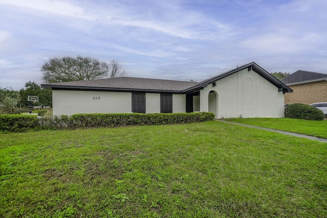 213 Westview Dr, Sealy, TX 77474 - single story home with a front lawn and brick siding