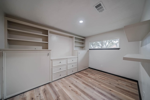 213 Westview Dr, Sealy, TX 77474 - spacious closet featuring light wood-type flooring and visible vents