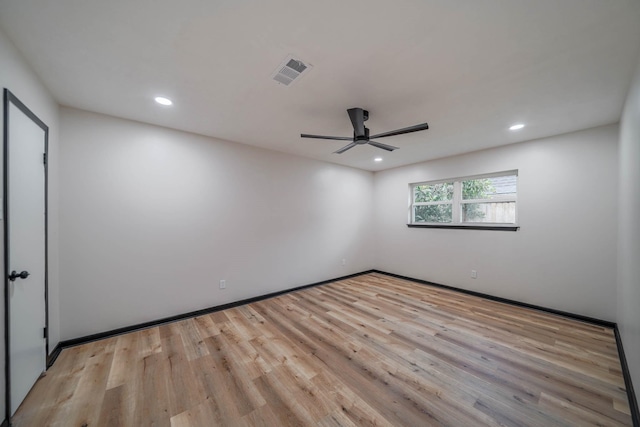 213 Westview Dr, Sealy, TX 77474 - unfurnished room with ceiling fan, recessed lighting, visible vents, and wood finished floors