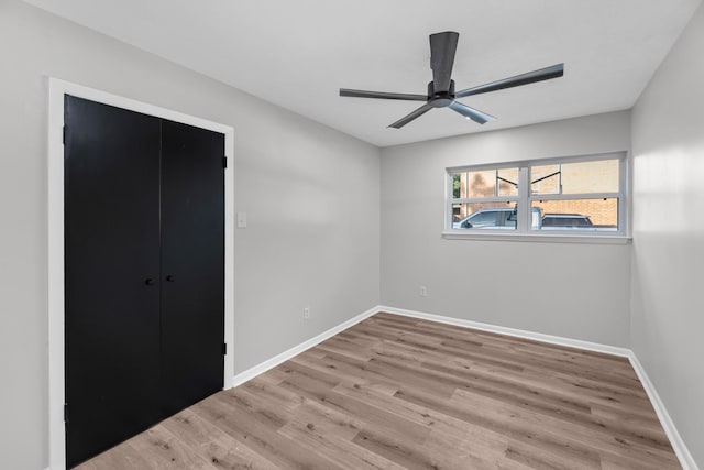 213 Westview Dr, Sealy, TX 77474 - unfurnished bedroom with wood finished floors and a ceiling fan