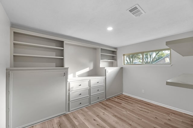 213 Westview Dr, Sealy, TX 77474 - unfurnished bedroom with light wood-type flooring and recessed lighting