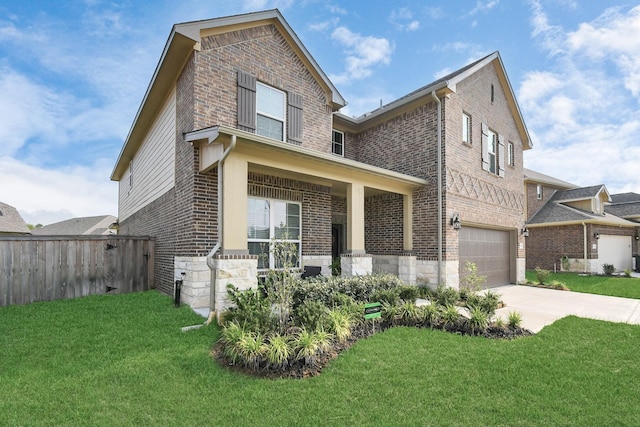 traditional-style house with an attached garage, brick siding, driveway, and fence