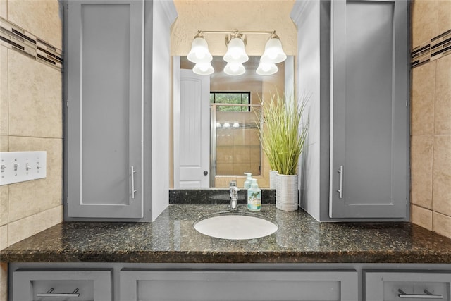 1316 Norham St, Houston, TX 77022 - bathroom featuring vanity and a chandelier