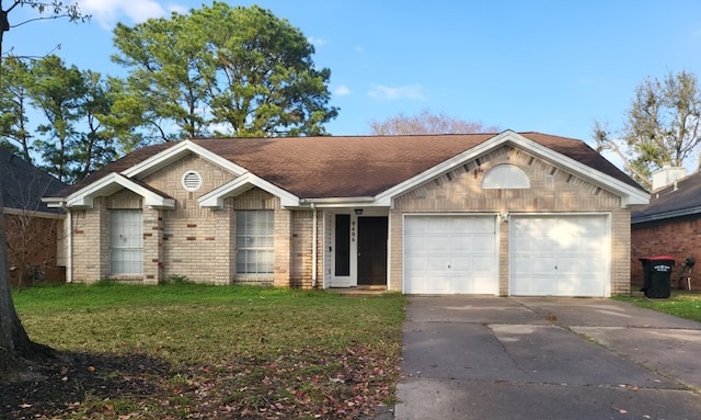 9406 Walnut Glen Dr, Houston, TX 77064 - ranch-style home featuring an attached garage, brick siding, concrete driveway, and a front yard