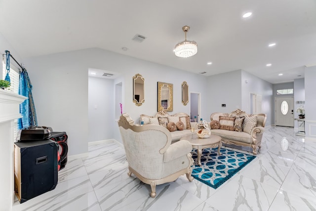 living area featuring lofted ceiling, marble finish floor, visible vents, recessed lighting, and baseboards