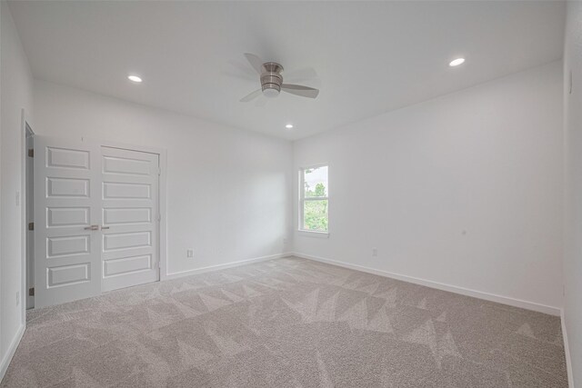 7307 W Knoll St, Houston, TX 77028 - unfurnished room with a ceiling fan, light carpet, and recessed lighting