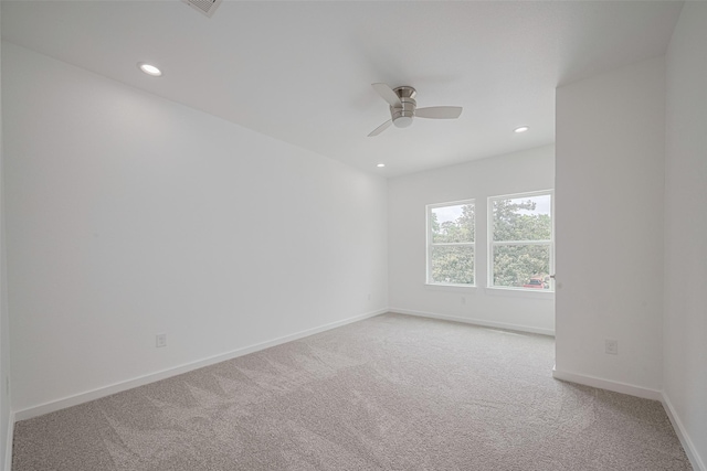 7307 W Knoll St, Houston, TX 77028 - empty room featuring carpet, baseboards, a ceiling fan, and recessed lighting