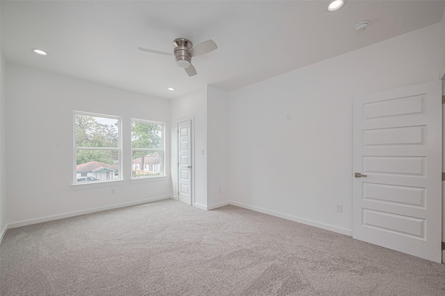 7307 W Knoll St, Houston, TX 77028 - empty room with light carpet, baseboards, a ceiling fan, and recessed lighting