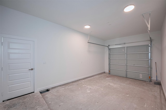 7307 W Knoll St, Houston, TX 77028 - garage featuring baseboards