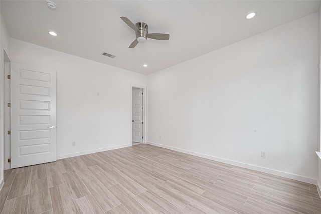 7307 W Knoll St, Houston, TX 77028 - empty room with a ceiling fan, baseboards, light wood finished floors, and visible vents