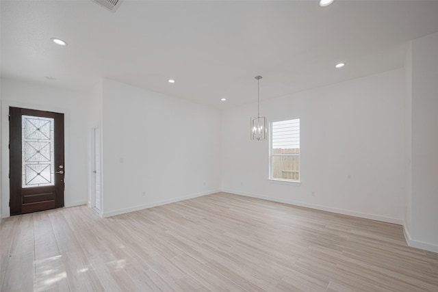 7307 W Knoll St, Houston, TX 77028 - entrance foyer featuring recessed lighting, an inviting chandelier, and light wood-type flooring