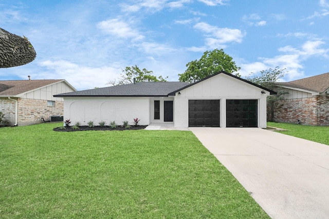 1502 Sierra Dr, Baytown, TX 77521 - view of front of home with an attached garage, concrete driveway, and central air condition unit