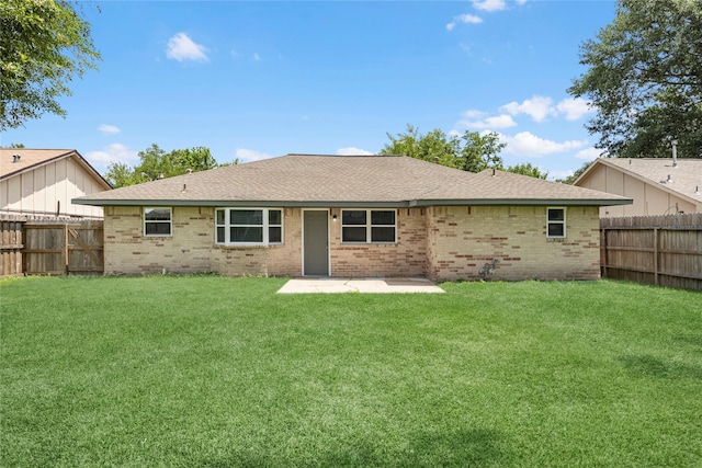 6727 Winding Trace Dr, Houston, TX 77086 - back of house with brick siding, a patio area, and a shingled roof