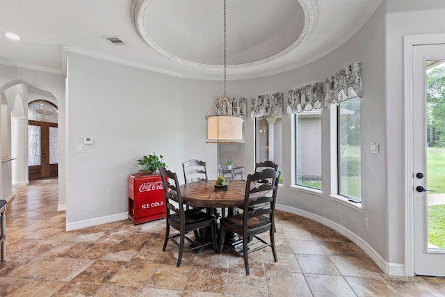 8483 Majestic Lake Ct, Montgomery, TX 77316 - dining area with ornamental molding, stone finish floor, visible vents, arched walkways, and baseboards
